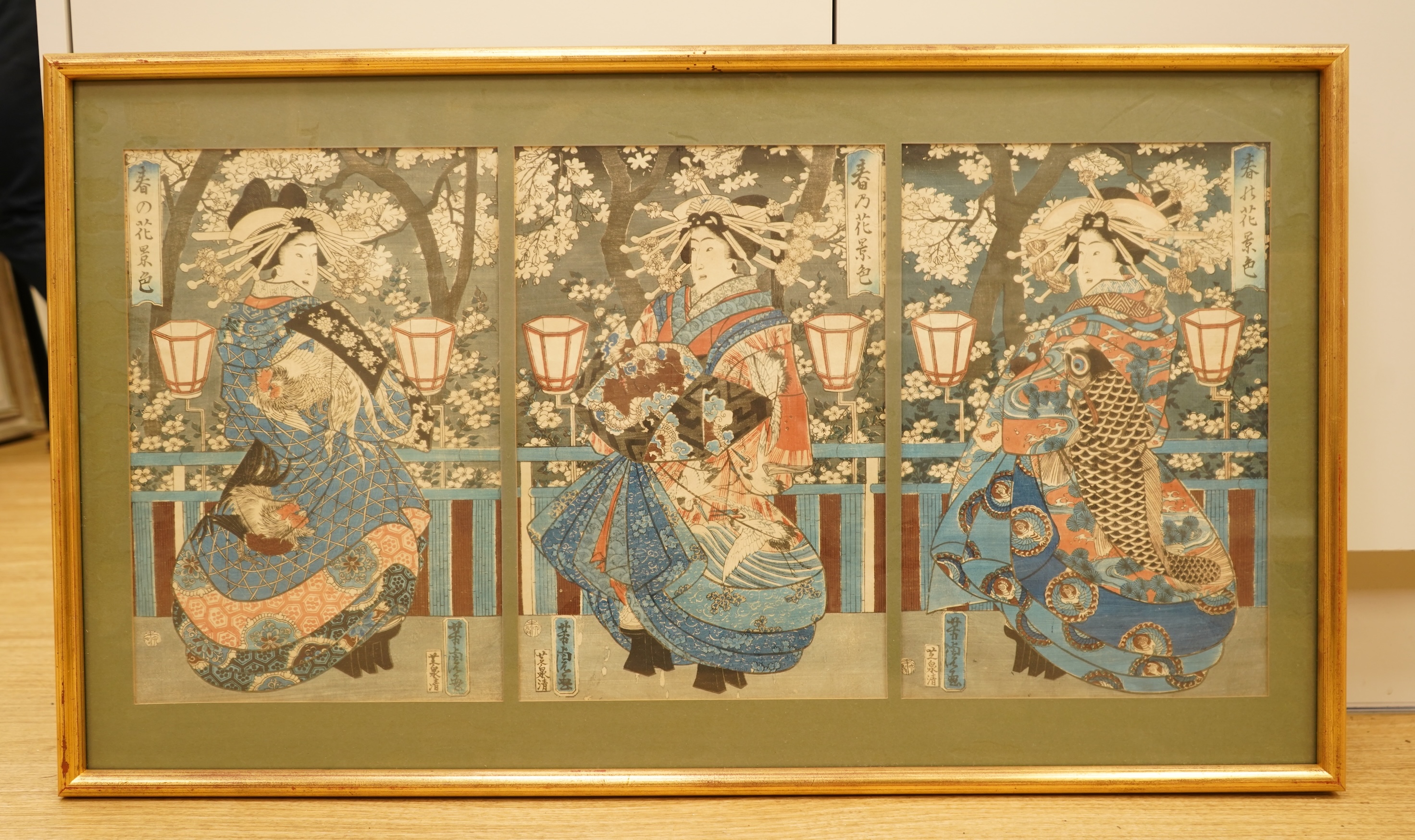 Yoshitora (Act. 1830s-80s), woodblock triptych, three courtesans in full attire standing under cherry blossoms, published by Sensei in 1859, ex. Japanese Gallery, Kensington Church Street, 35 x 74cm